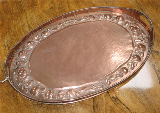 A Newlyn copper oval tray stamped Newlyn W.54cm